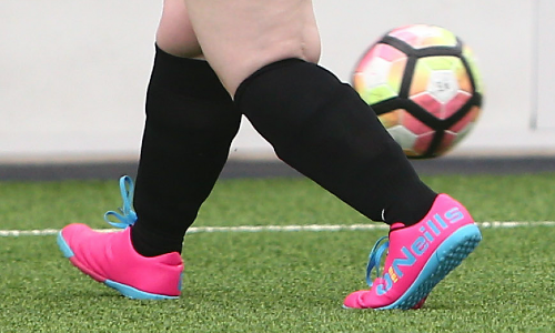 Someone playing walking football